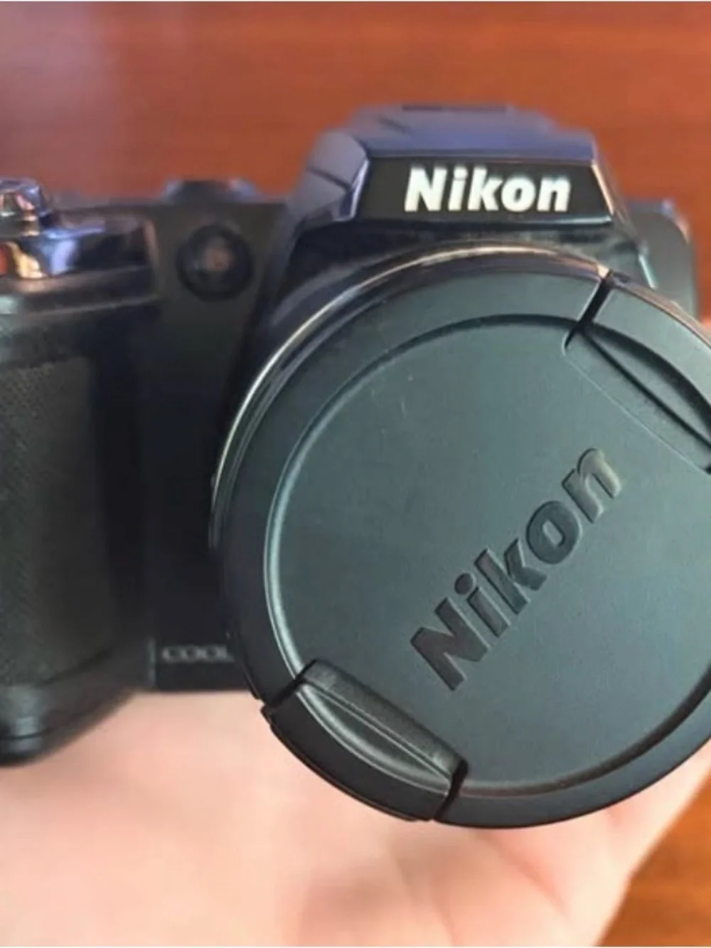 Nikon Coolpix L120 point and shoot camera with strap, lens cap, & 128gb SD card